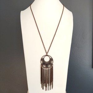 Metal scroll work pendant & tassel necklace